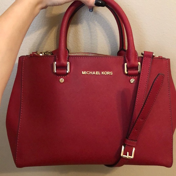 red michael kors purse